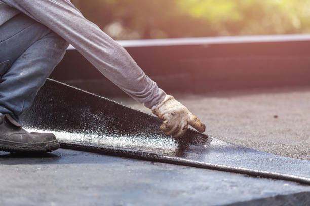 Professional Emergency Waterproofing technician working in Raymond, WA